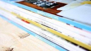 A pile of Upstairs Downstairs Magazines